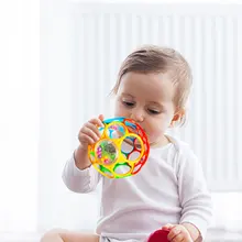 Newborn Baby Grasping Ball Baby Sensory Toy Flexible To Grip Design Hole Rattle Hand Catching Ball For Baby Learning Grasping